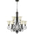 Foyer Chandelier with White Glass Shades, Curvaceous Arms, and Symmetrical Balance. Celebrate timeless lighting design with this luxury Quorum International fixture. Perfect for traditional and transitional spaces. 31"W x 36.25"H. 2-Year Warranty. UL Listed for Dry Locations. 9 Medium E26 Bulbs (60W, not included). Dimmable.